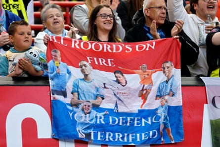 Manchester City fans display a banner of Jill Roord inside the stadium before the WSL match against Manchester United in May 2025.