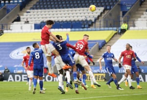 Manchester United’s Harry Maguire heads at goal.