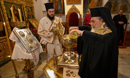 Oils being mixed and blessed in Jerusalem to make the chrism oil that will be used at the king’s coronation.