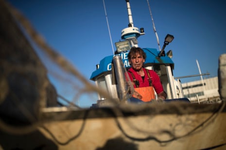Juan Camacho at the bow of his fishing boat in waters that are part of the Doñana national park