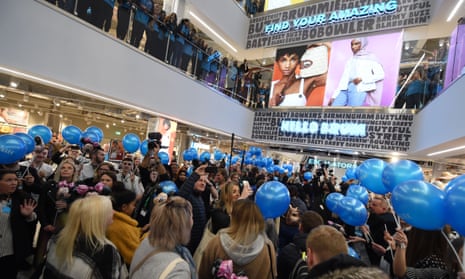 Customers with balloons at the grand opening of the world’s largest Primark in Birmingham