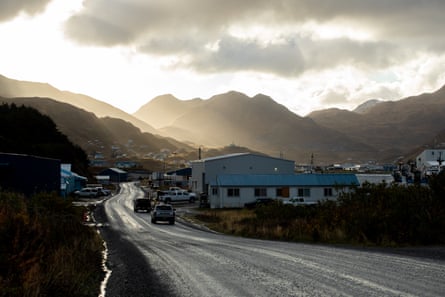 cars drive along a road
