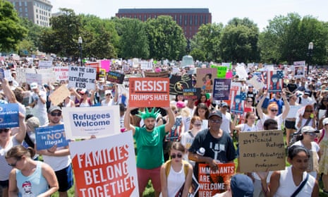 Thousands of people attend a ‘Families Belong Together’ rally at Lafayette Park across the street from the White House in Washington on Saturday.
