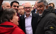 Jeremy Corbyn is greeted by supporters at a campaign event in Bolton.