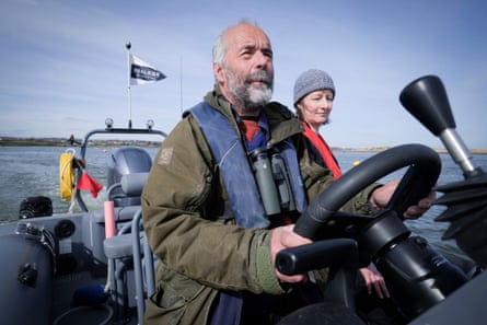 Two people in the boat at sea