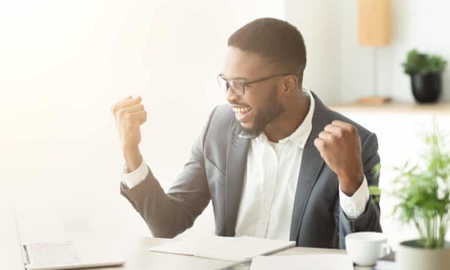 Man celebrating getting a job.