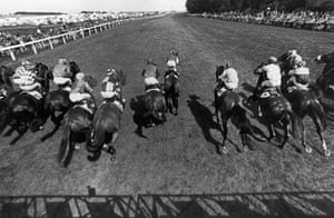 Piggott, fourth left in spotted hat, riding The Minstrel surge out of the stalls at the start of the 1977 Derby