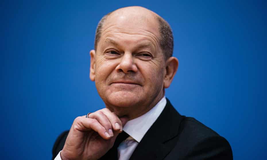 Olaf Scholz attends a press conference after the signing of the coalition agreement.