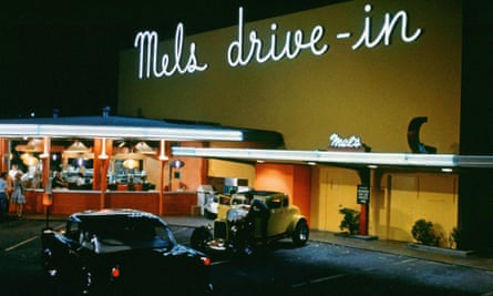 Hot rods and neon signs in American Graffiti (1973)