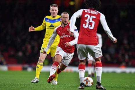 Arsenal’s Jack Wilshere surges past Bate Borisov’s Vitale Rodionov.