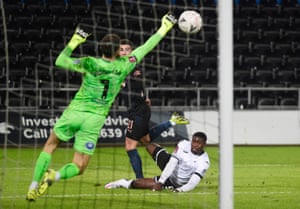 The Swans’ Freddie Woodman thwarts Ferran Torres.