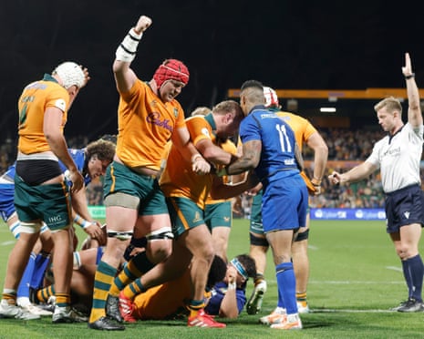 The Wallabies celebrate a try to Billy Pollard against Italy at HBF Park