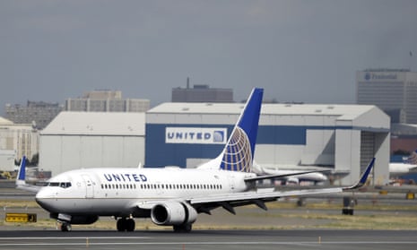 FILE - In this Sept. 8, 2015, file photo, a United Airlines passenger plane lands at Newark Liberty International Airport in Newark, N.J. United said on Monday, March 27, 2017, that regular-paying fliers are welcome to wear leggings aboard its flights, even though two teenage girls were barred by a gate agent from boarding a flight from Denver to Minneapolis Sunday because of their attire. (AP Photo/Mel Evans, File)