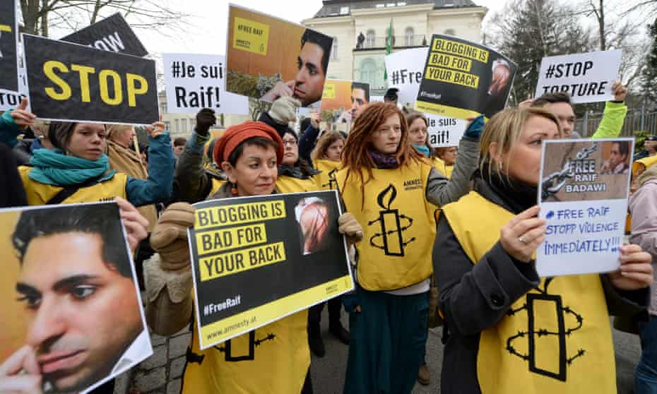 People protest outside the Saudi embassy in Vienna in January 2015, against the flogging of Raif Badawi.