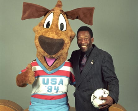 Pelé poses with the as yet unnamed mascot of the 1994 World Cup mascot at its introduction in New York on 14 January 1992