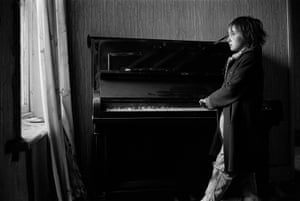 Heather Playing a Piano in a Derelict House (Byker), 1971