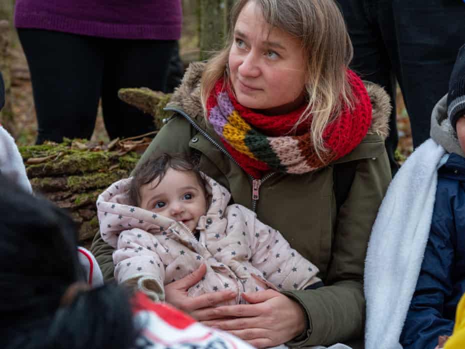 Anna Alboth with refugees in Narewka, Poland, near the Belarus border.