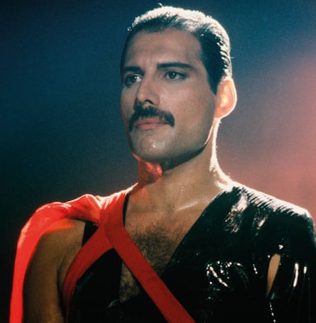 Head and shoulders shot of Mercury in black outfit with red sash