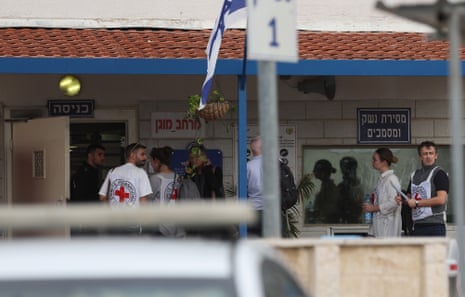 Representatives of the International Committee of the Red Cross (ICRC) arrive at the West Bank military prison of Ofer, north of Jerusalem, 25 November 2023, ahead of an expected release of Palestinian prisoners. Israel and Hamas agreed to a four-day ceasefire, with 50 Israeli hostages, women and children, to be released by Hamas.
