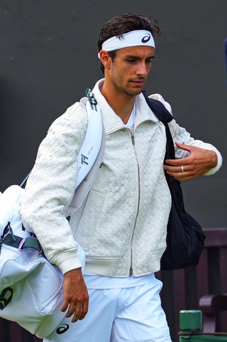 Lorenzo Musetti in his white leather jacket.