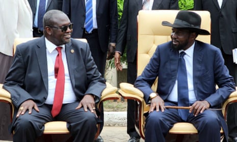South Sudan president, Salva Kiir, right, and former rebel leader and now first vice-president Riek Machar attend a government ceremony in capital Juba.