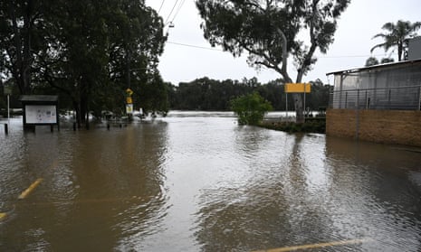 A carpark is inundated by flood waters in Lansvale in south-western Sydney on Sunday. The NSW SES received more than 1,000 calls for assistance overnight and conducted at least 26 rescues as heavy rain and wind continued to batter Sydney’s west.