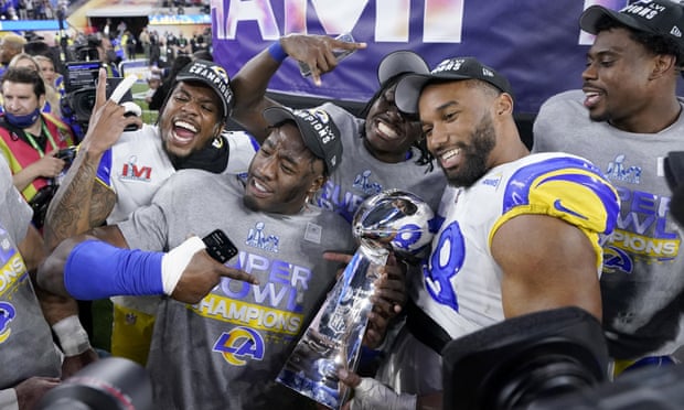 Los Angeles Rams players with the Super Bowl trophy in February
