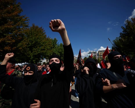 Supporters of former Kosovo President Hashim Thaci protest after he was found guilty of war crimes by the Kosovo war crimes tribunal in The Hague, in Pristina, Kosovo.