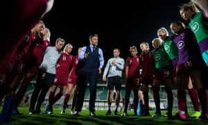 Phil Neville talks to his players at the end of last month’s match against Portugal.