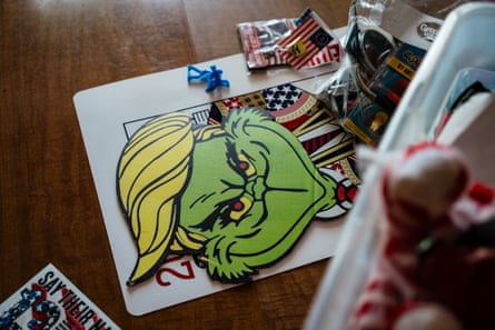 A Trump Grinch sticker and other Maga merchandise.