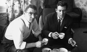 The gangsters Ronnie and Reggie Kray at home having a cup of tea.