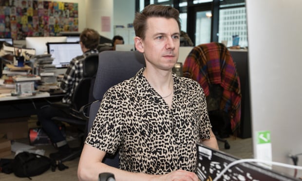 Tim Jonze at his desk in the Guardian office.