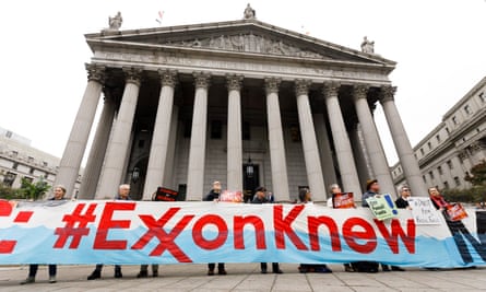 Climate protesters in October 2019 outside the New York county courthouse, where the trial against Exxon took place.