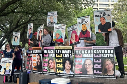 People holding signs
