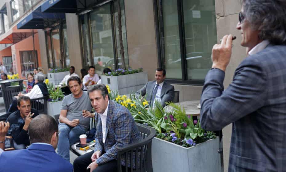 Jerry Rotonda, center back row wearing a tie, pictured with Michael Cohen, center, and friends near the Loews Regency hotel on Park Ave on Friday in New York City.
