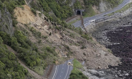 A landslide blocks State Highway One and the main railway line north of Kaikoura.