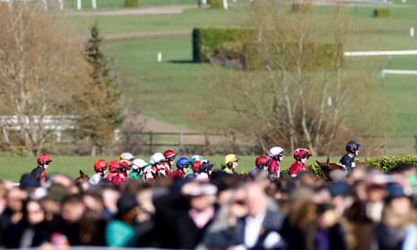 The jockeys get ready for the start of the race.