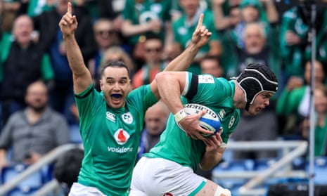 Ireland's James Lowe celebrates as James Ryan scores a try in the Six Nations win over Italy