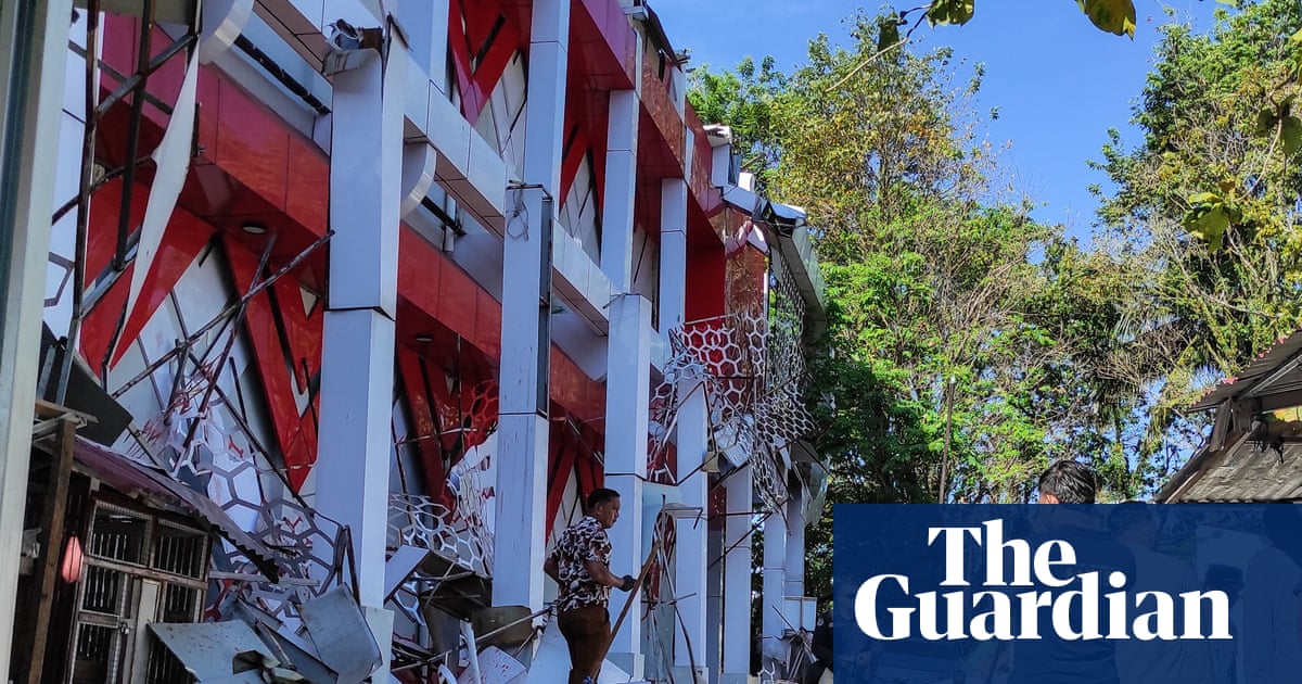 One killed and buildings damaged as magnitude 7.4 earthquake strikes Indonesia