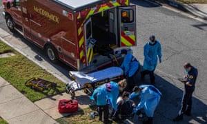 Los Angeles county paramedics administer oxygen to a potential Covid-19 patient in Hawthorne, California, one of the states where the new variant has been detected.
