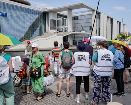 Protesters wear vests reading ‘Grandmas against the right’ joined the demonstration as Alice Weidel was interviewed.