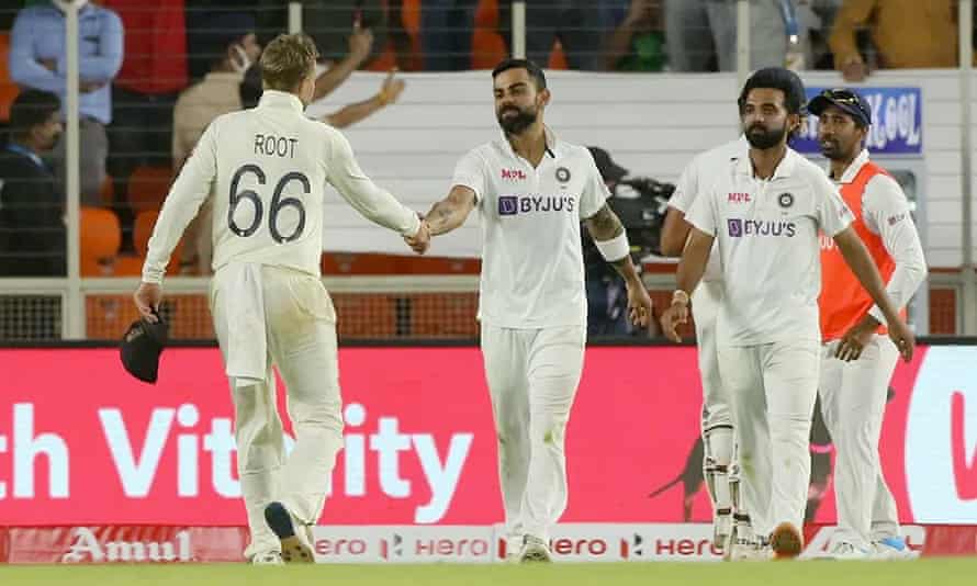 England captain Joe Root congratulates India’s captain Virat Kohli on his side’s victory.