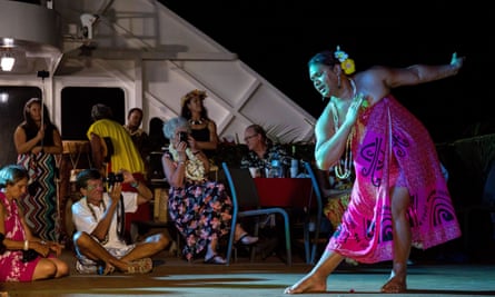 A traditional dance performed on a cruise ship in the Pacific Ocean