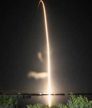 A SpaceX Falcon 9 rocket streaks toward space