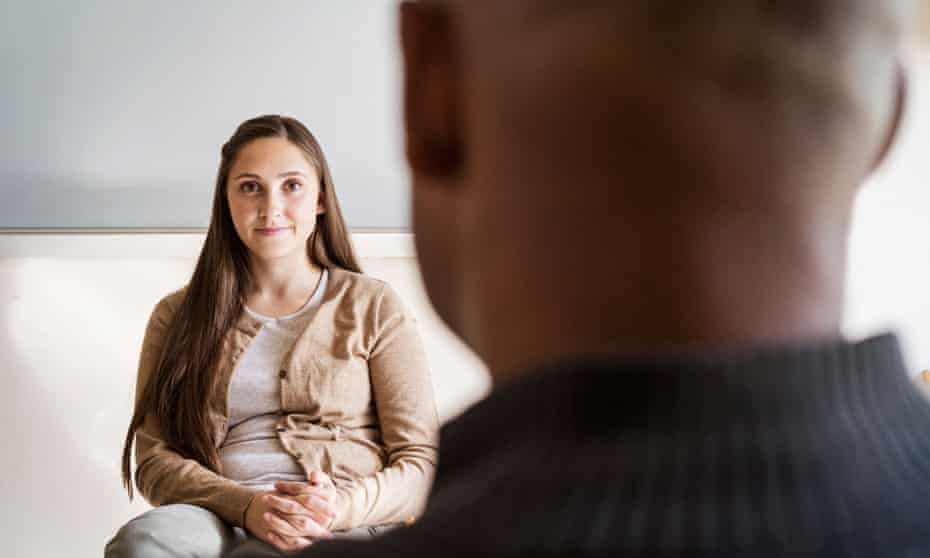 therapist listening to her client