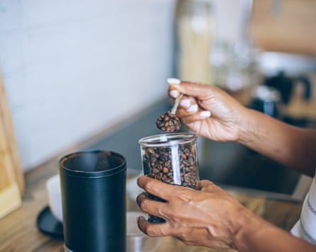 Grinding coffee beans in a coffee grinder.