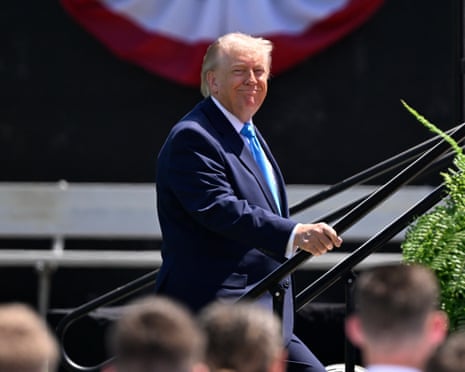 Donald Trump arrives for the commencement address at the US Coast Guard Academy in New London, Connecticut.