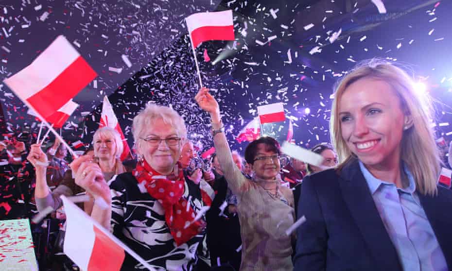 Supporters for the conservative opposition Law and Justice party at a rally in Warsaw.