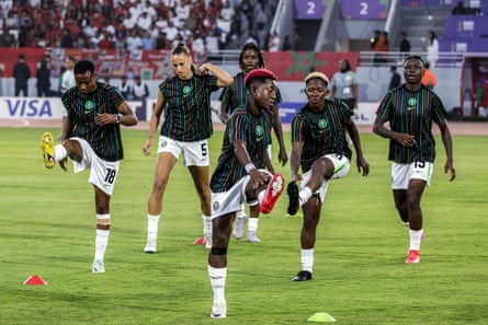 Nigeria’s players warm up on the pitch before the Wafcon final in Rabat.