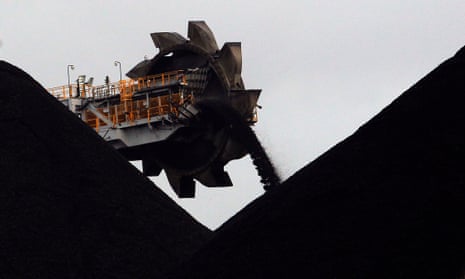 A reclaimer places coal in stockpiles at the coal port in Newcastle.